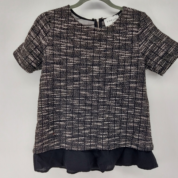 Emelia black and white short sleeve blouse with sheer ruffle bottom - Picture 1 of 5